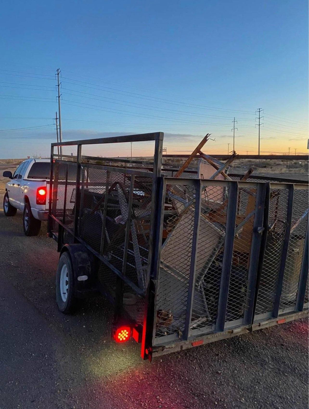 AH Dumpsters crew providing hauling and dumpster rental services in Windsor, CA
